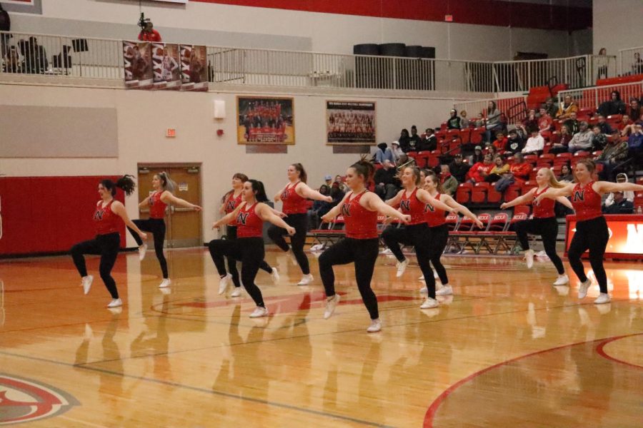 The+NHS+dance+team+brings+the+sass+%0Aduring+a+halftime+performance+at+%0Athe+boys+varsity+basketball+game.