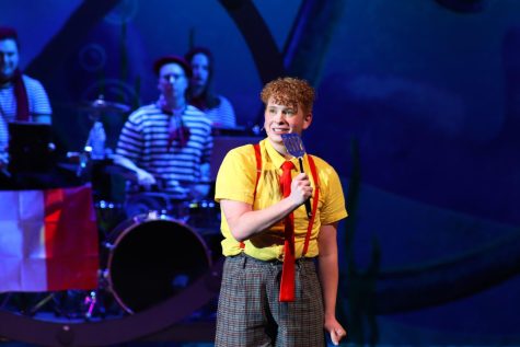 Singing into his spatula, junior John Perry personifies the titular sponge during a dress rehearsal of “The SpongeBob Musical.” “Every night there were over 1,000 people in the audience,” Perry said. “That was honestly one of the most mind blowing parts, that we got to go out there and tell that story to that many people, and let that many people step out of their lives and invest in SpongeBob for a second.”
Photo by Justice Jones
