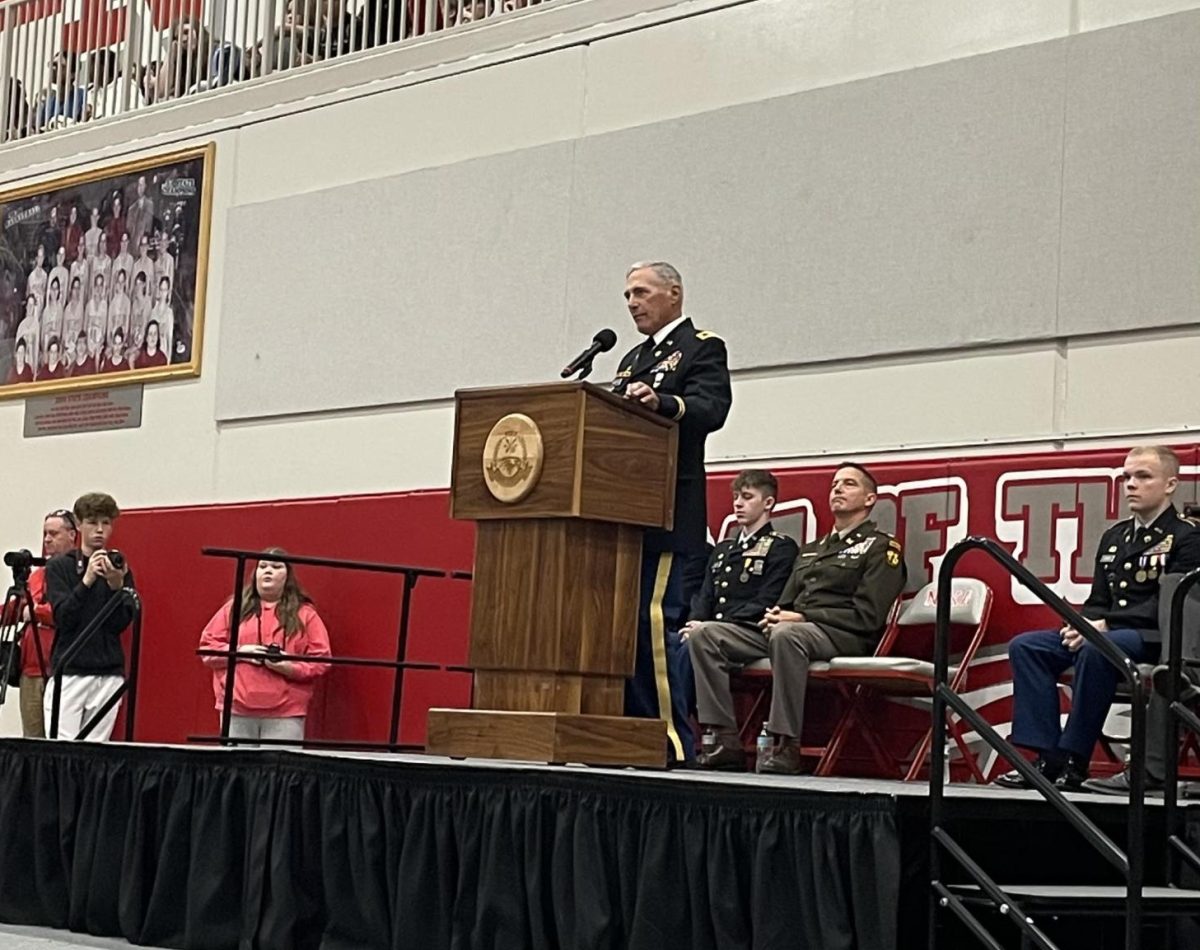 Colonel (retired) Steve Vanderhoof addresses NHS students