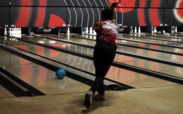 Senior Travis Hoskinson bowls a strike.