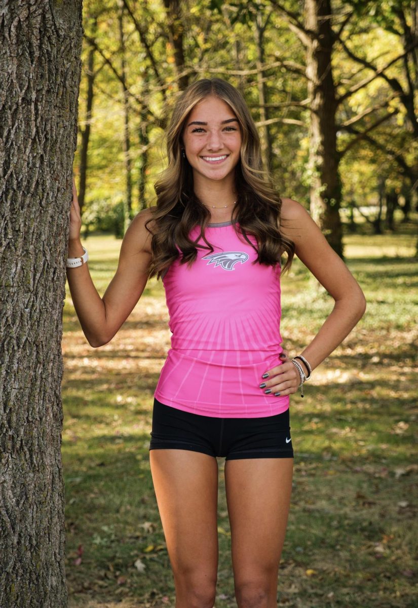 Sophomore Brianna Bidinger poses for Cross-Country pictures
