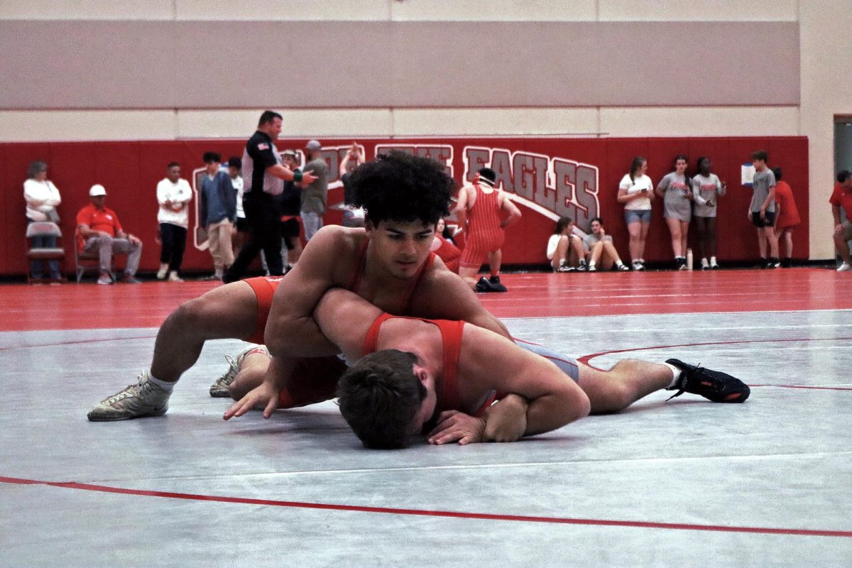 Kaden Young (11) and Beckett Malin (12) compete in a practice tournament on Nov. 18.