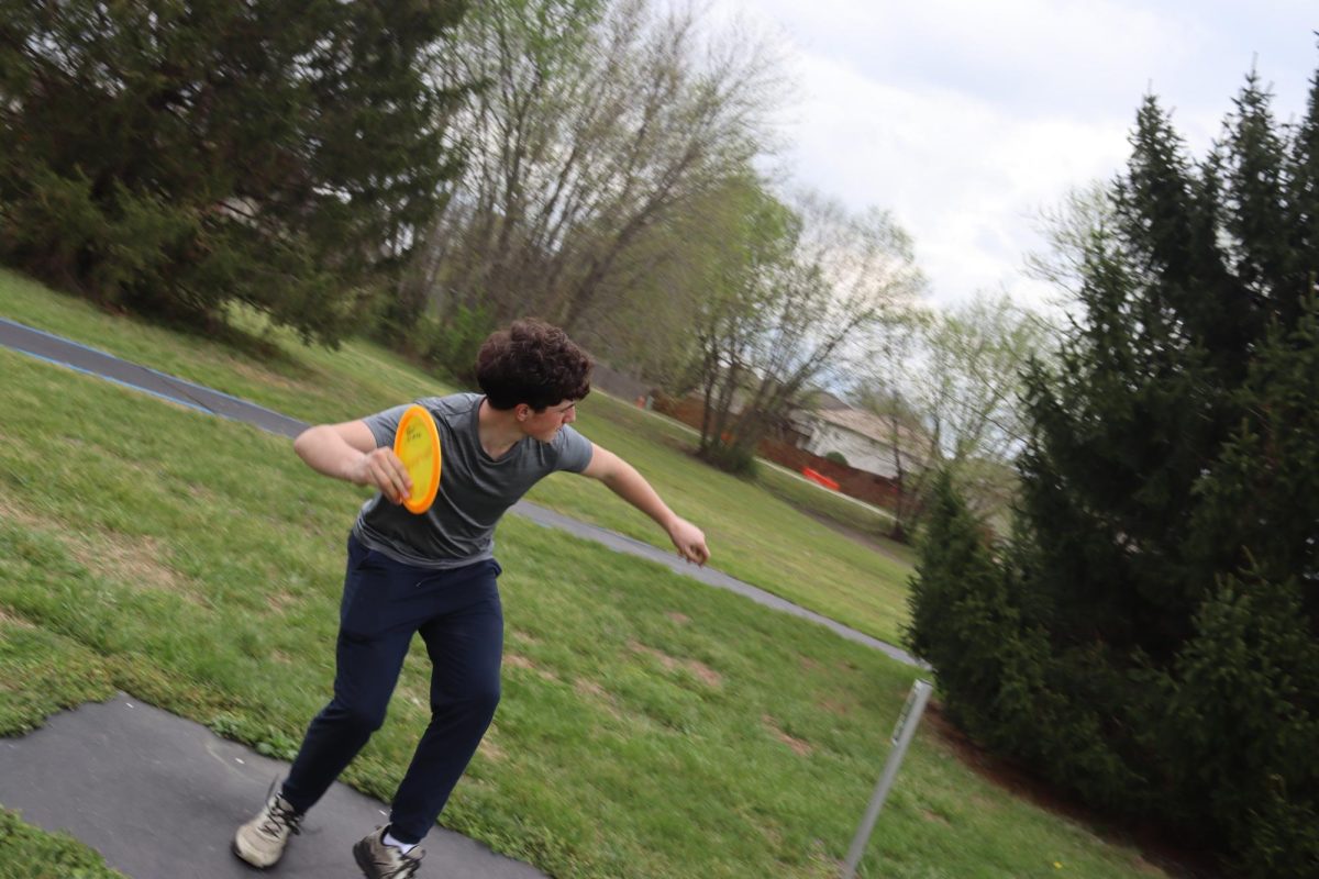 Colyn O’Conner winds up to throw the disc. “I play because I enjoy it and it’s just a lot of fun," O'Conner said. "I get to throw my arm up, which is fun.”