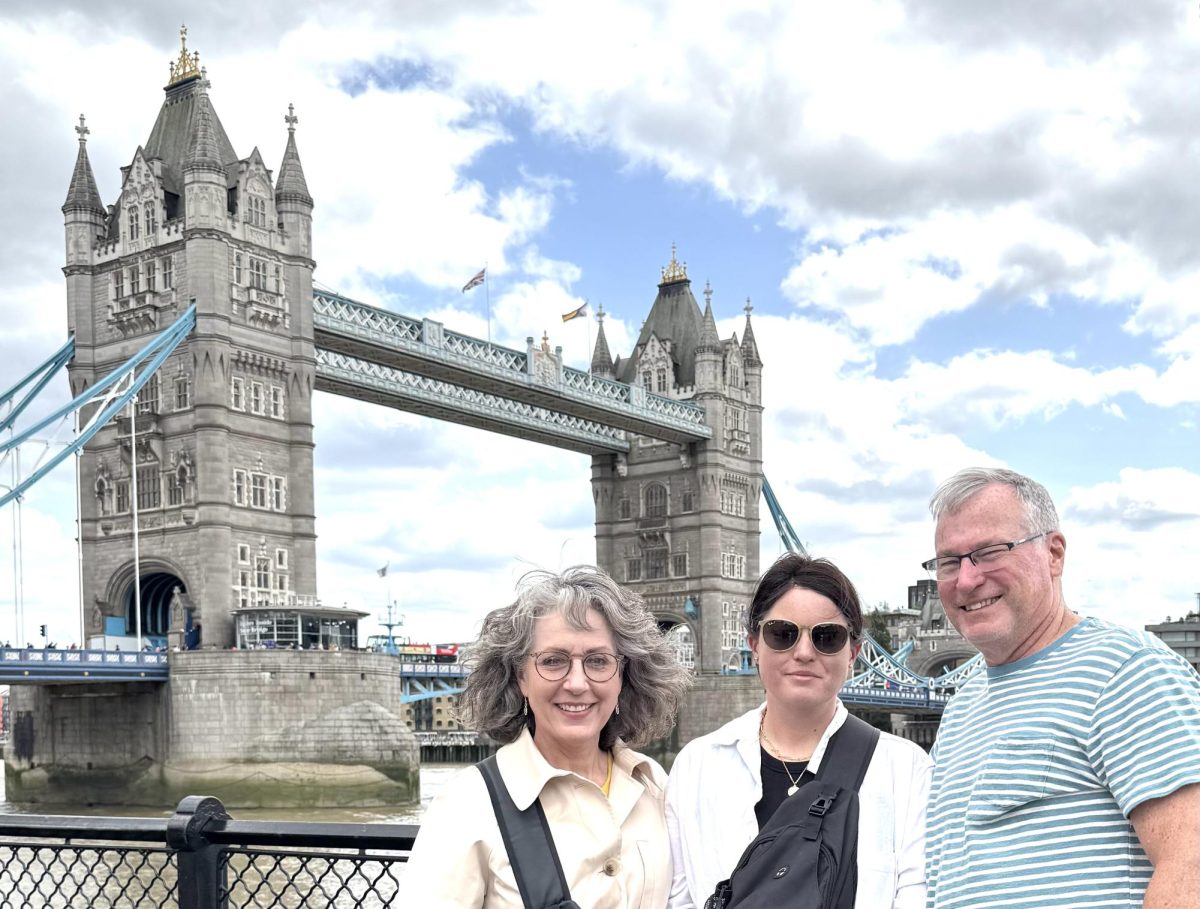 Retired English teacher Jon Stammers at the London Bridge with his family for his retirement trip. 
