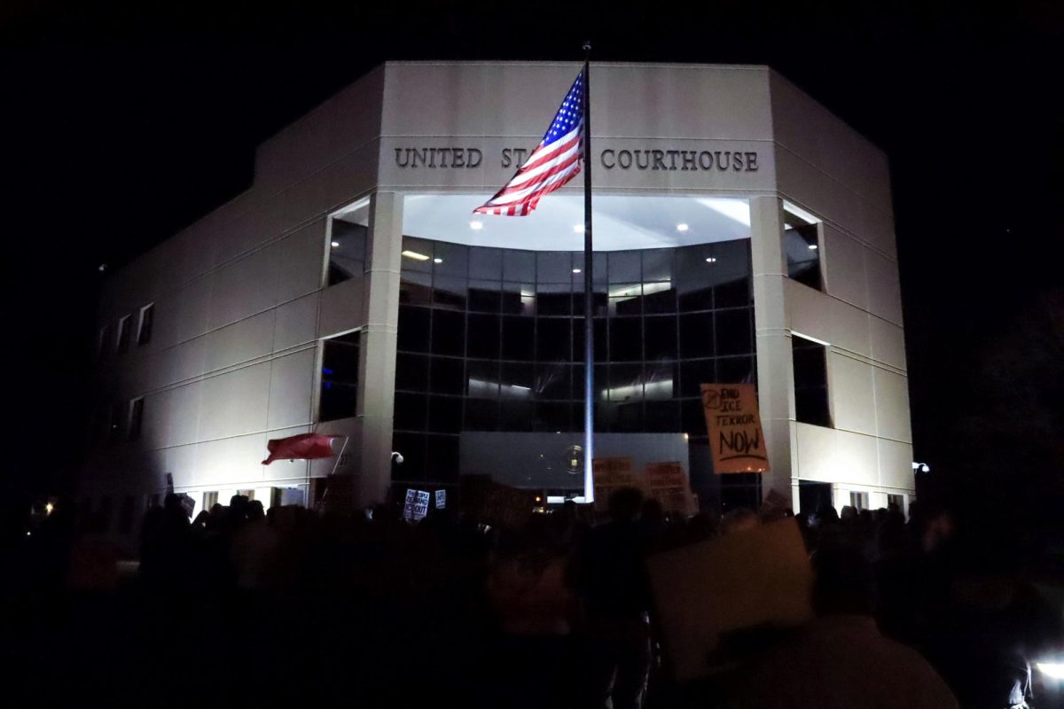 Anti-ICE protesters stand outside U.S. District Court in Springfield on Jan. 8. 
